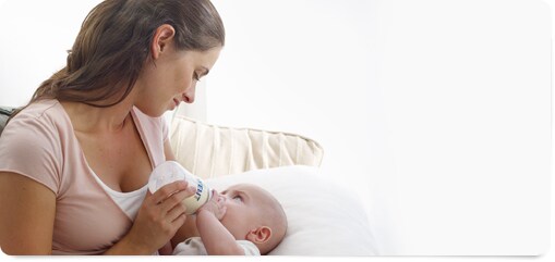 Bottle feeding positions breastfeeding positions. Bottle feeding positions
