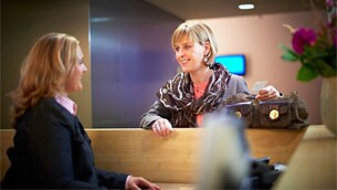 patient talking with reception