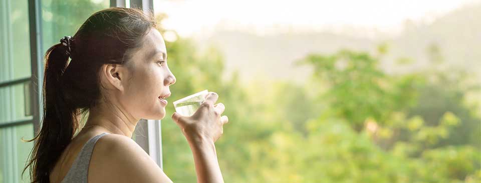 A woman drinking water