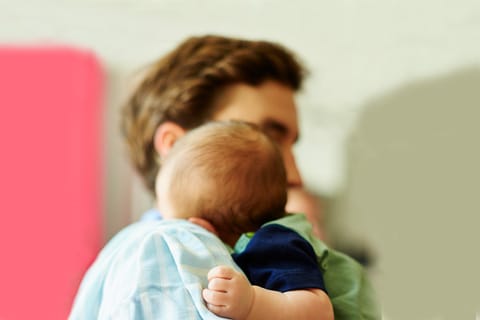 Baby Spitting Up? Why Newborns Vomit & What to Do