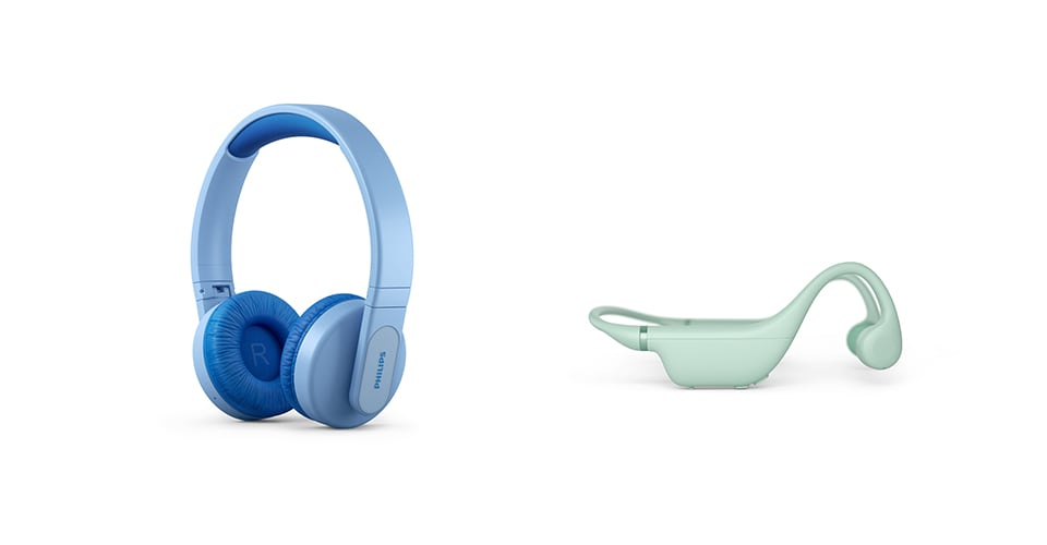 A blue headband kids headphones and a green open ear kids headphones