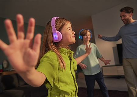 Kids enjoying music using Philips on-ear headphones
