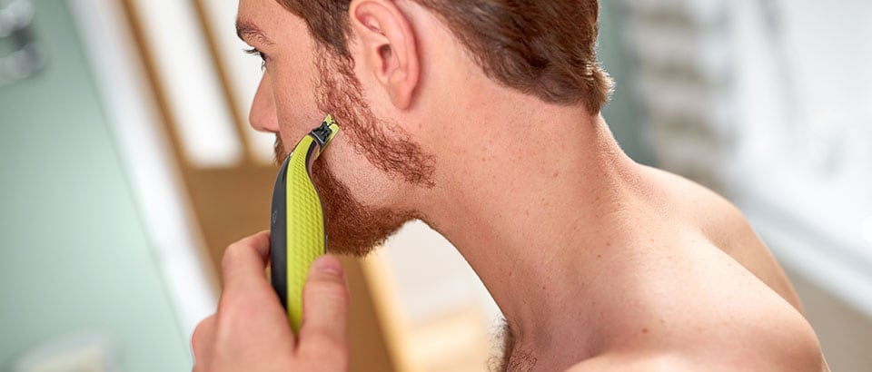 Man creating soul patch beard with a Philips Oneblade