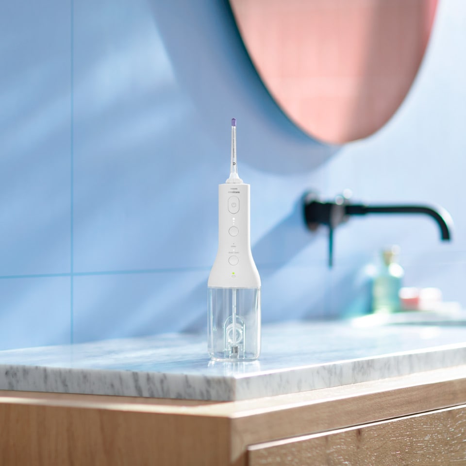 Sonicare Power Flossers arranged on a countertop