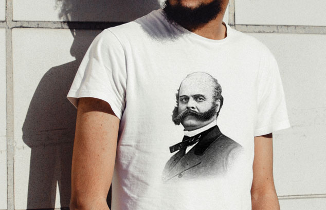 Man in t-shirt printed with a photo of Ambrose Burnside and his unusual sideburn-to-moustache beard.