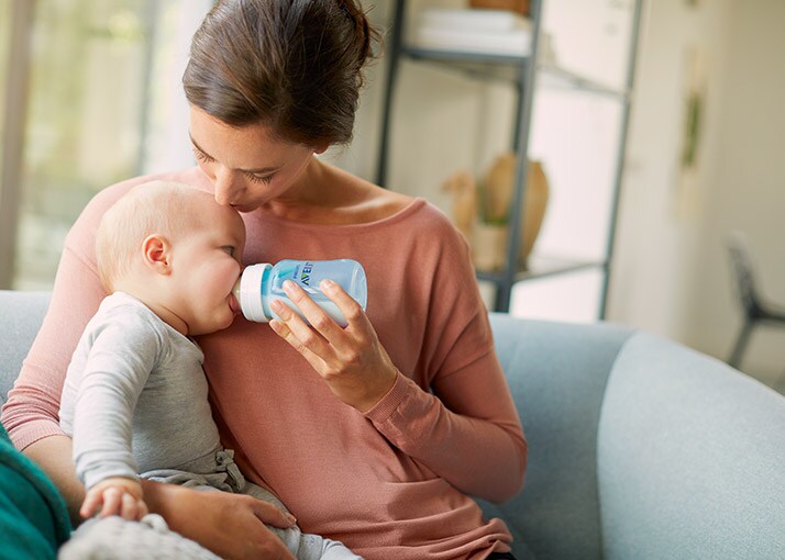 Feeding positions that can help with common baby issues