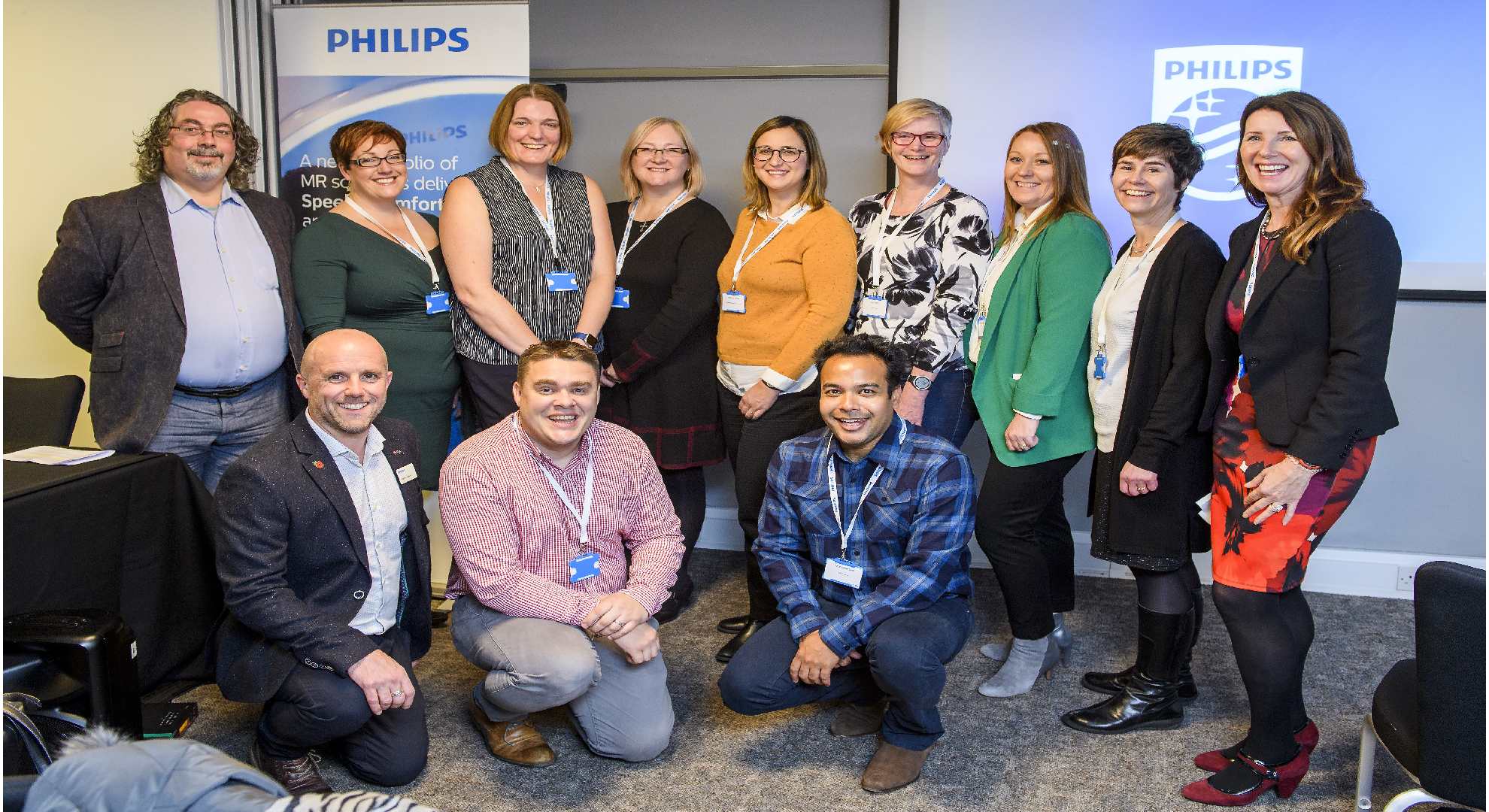 Download image (.jpg) Back row, left to right, Matthew Clemence, PhD, Senior Clinical Scientist MR, Philips UKI; Ruth Pearson, MRI Clinical Lead Training Facilitator, Cobalt; Claire Hughes, MRI Modality Lead, University Hospitals Birmingham; Dr. Elizabeth Loney, Associate Medical Director & Consultant Radiologist, Calderdale & Huddersfield NHS Foundation Trust; Dr. Marianna Telesca, Consultant Breast Radiologist, Worcestershire Acute Hospitals NHS Trust; Lucy Thorpe, Senior MR Radiographer, Poole Hospital NHS Foundation Trust;.   From Philips UKI   Lynsey Cameron Clark, Clinical Applications Specialist MR; Jenny Jeffries, Sales Specialist MR and Dawn Phillips Jarrett, Business Marketing Manager, MR   Front row, kneeling, left to right, Jonathan Coupland, Sales Specialist MR, Philips UK; Tom Edwards, Principal Radiographer, The Christie Proton Beam Therapy Centre, and Varun Daniel Singh, Lead Cardiac MRI Radiographer, Bupa Cromwell Hospital  (opens in a new window)