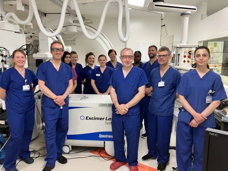 Dr Stephen Hoole (second from left), Dr Peter O’Kane (centre) and representatives from Philips and the Royal Paporth Hospital cath lab team